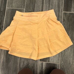 Lululemon orange pace rival mid-skirt, long size 2, summer glow